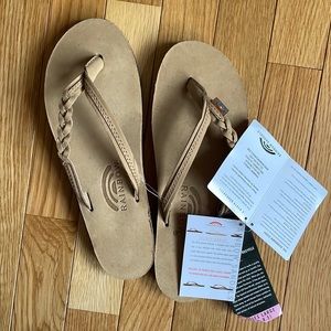 Rainbow women’s sandals size 7.5-8.5, never worn, tags on